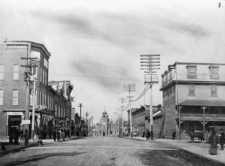 John Street in 1906, a dirt road with board sidewalks
